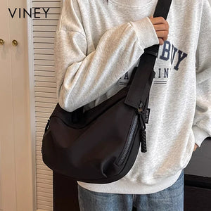 VINEY Lightweight Canvas Crescent Shoulder Bag in black, lifestyle view