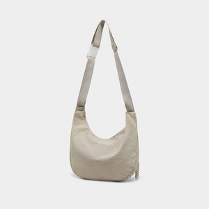 VINEY Lightweight Canvas Crescent Shoulder Bag in beige, back view