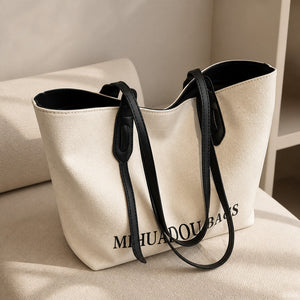 VINEY Ivory Canvas Commuter Tote Bag in ivory, clean lifestyle view