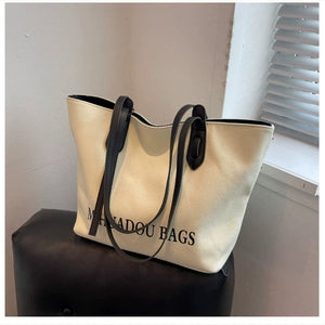 VINEY Ivory Canvas Commuter Tote Bag in ivory, side profile