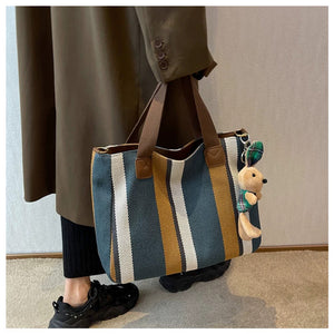 VINEY Striped Canvas Commuter Tote Bag in blue, carried view