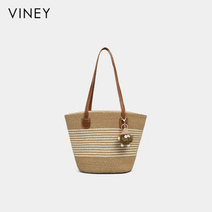 VINEY striped woven straw tote with brown straps, cream stripes and plush charm, front view