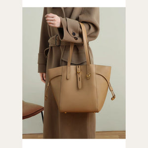 VINEY Winged Leather Bucket Tote Bag in brown, lifestyle front