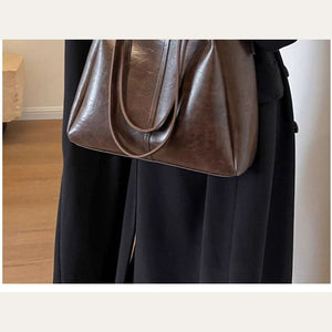 VINEY Coffee Leather Convertible Tote Bag in coffee, side carry