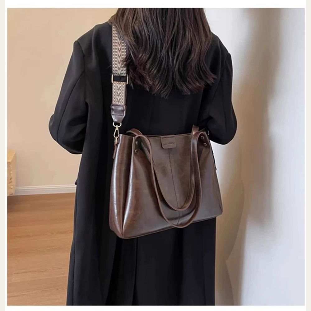 VINEY Coffee Leather Convertible Tote Bag in coffee, front lifestyle
