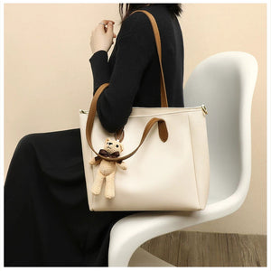 VINEY Leather Commuter Tote Bag with Bear Charm in beige, lifestyle view