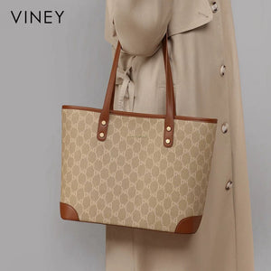 VINEY Rock Brown Monogram Commuter Tote Bag in brown, lifestyle carry