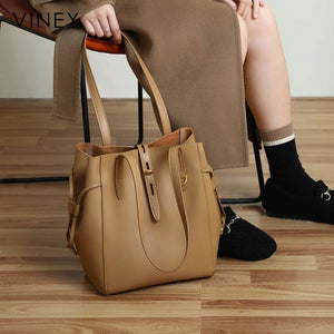 VINEY Winged Leather Bucket Tote Bag in brown, hand carry