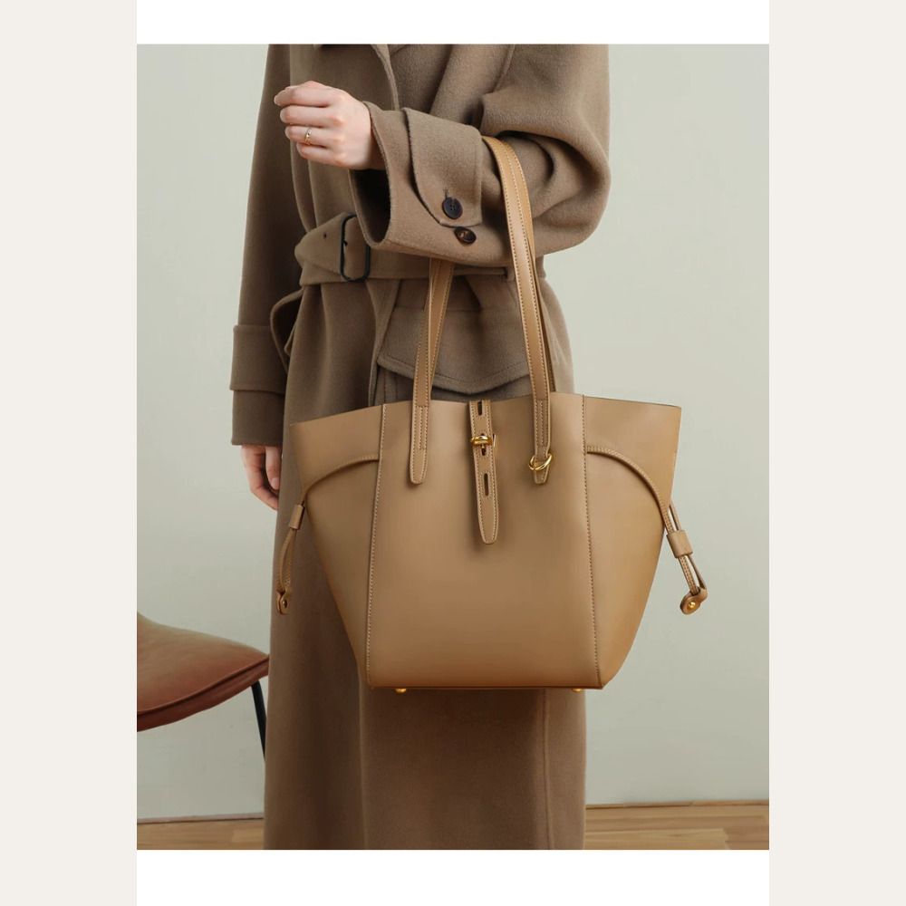VINEY Winged Leather Bucket Tote Bag in brown, lifestyle front